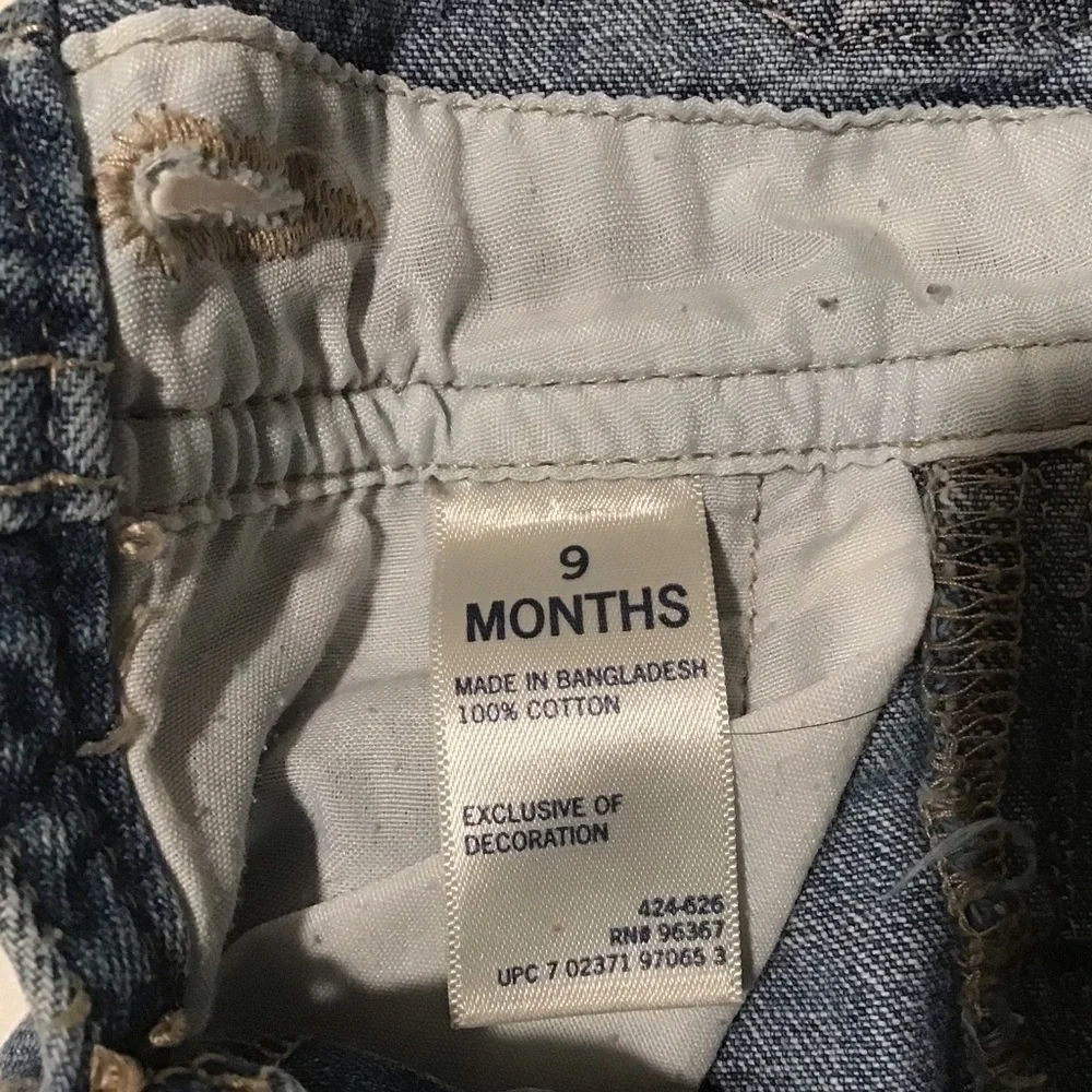 Oshkosh overalls.